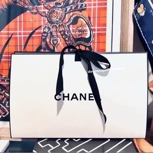 Authentic Chanel ribbon tie top gift box